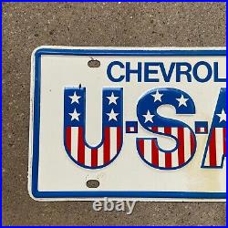 1976 Chevy USA 1 Dealer License Plate Embossed Steel Chevrolet American Flag